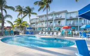 three story hotel with pool area at capt hirams sebastian space coast