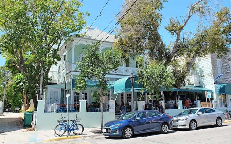 two story house hotel with trees viewed from street at casablanca hotel key west