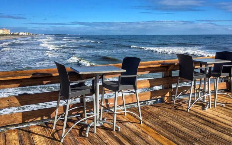 two top seating along pier over beach at pier 62 oceanfront restaurant bar cocoa beach