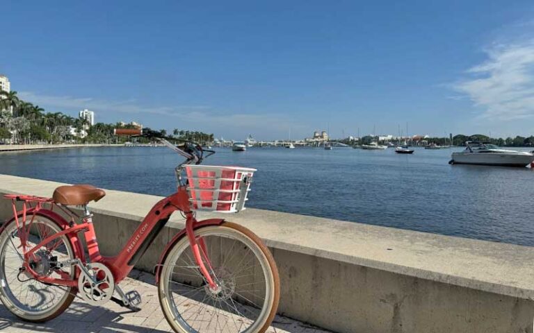 view of intracoastal waterway with ebike at palm beach ebike rentals west