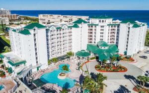 aerial view of high rise complex with pool and ocean at the resort on cocoa beach