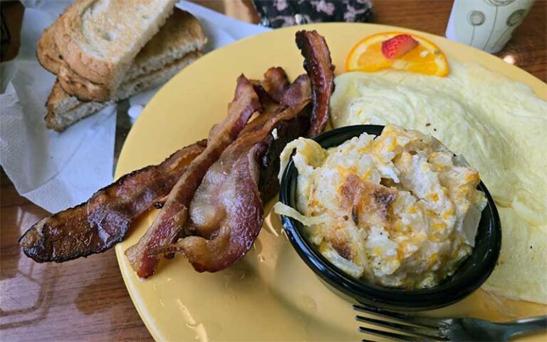 bacon and eggs entree with toast and coffee at ginnys jane es cafe gifts anna maria island