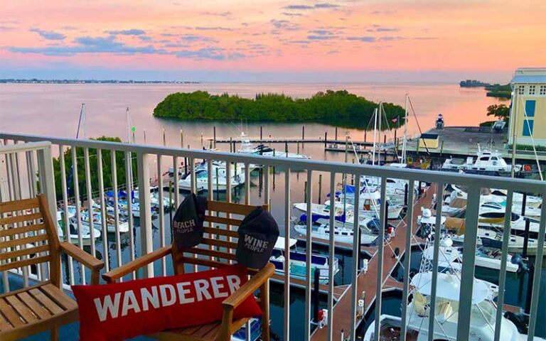 balcony view of marina and sunset sky at compass hotel anna maria sound by margaritaville bradenton