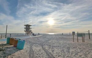 beach with lifeguard tower and volleyball nets at manatee public beach bradenton anna maria island