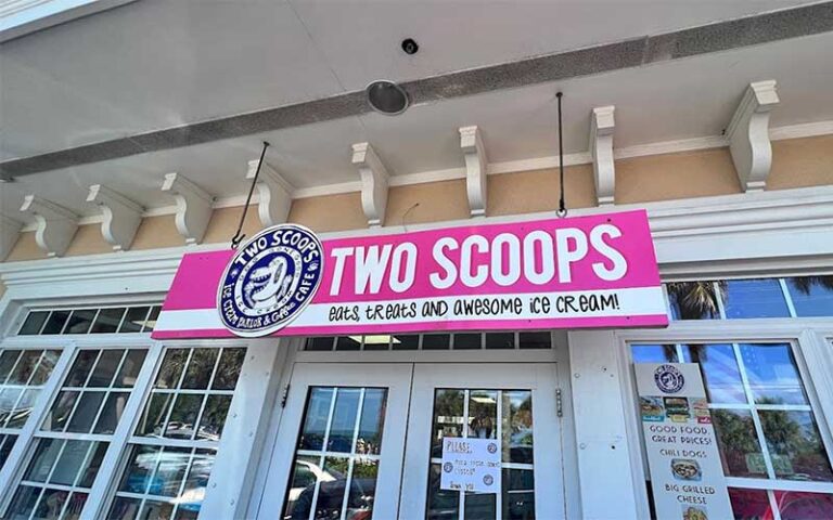 front entrance with banner sign over doors at two scoops anna maria island