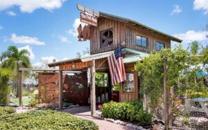 front exterior of rustic style building at the fish hole miniature golf bradenton beach anna maria island