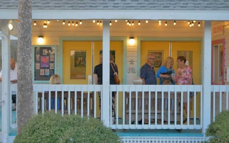 front porch of house with box office window at the island players anna maria