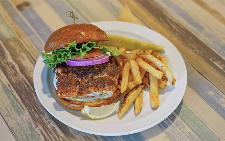 grouper burger with side at beach house waterfront restaurant bradenton beach anna maria island