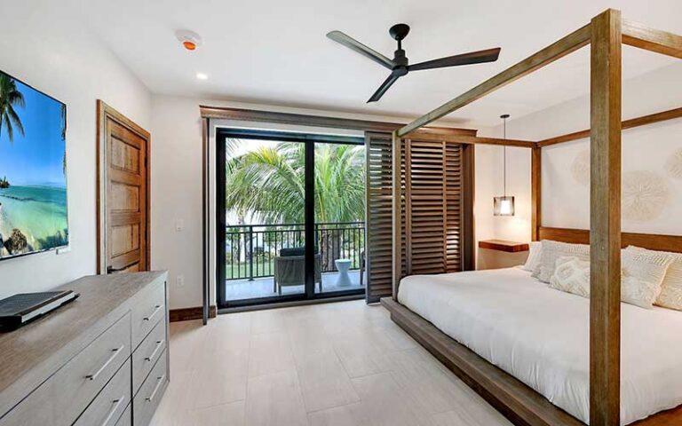 king bed suite with balcony pool view at bali hai beach resort holmes anna maria island