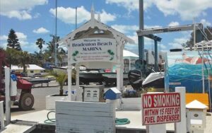 marina sign with boats and gas pump at bradenton beach marina anna maria island