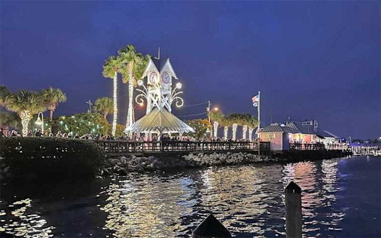 night view of lighted pier with clock tower at bridge street pier bradenton beach anna maria island