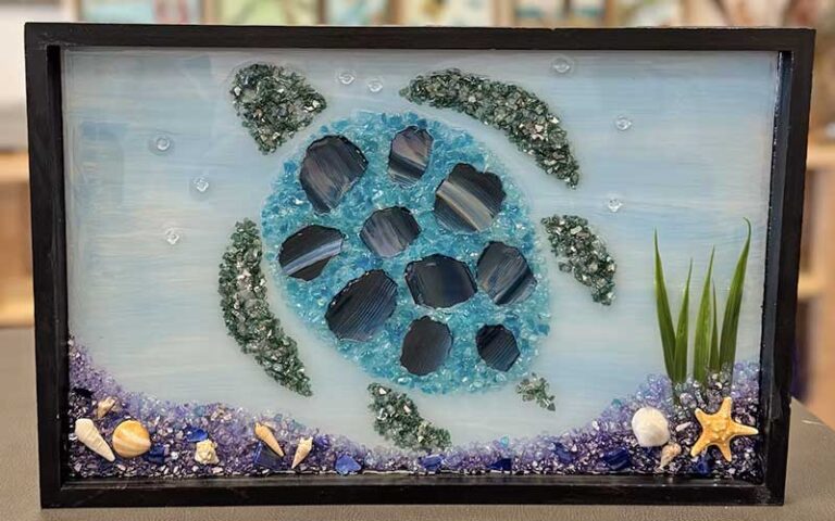 ornate sea turtle artwork with crushed glass at fragments art studio kissimmee