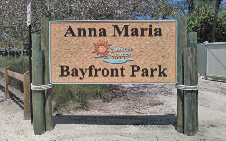 park sign with fence and entrance at bayfront park anna maria island