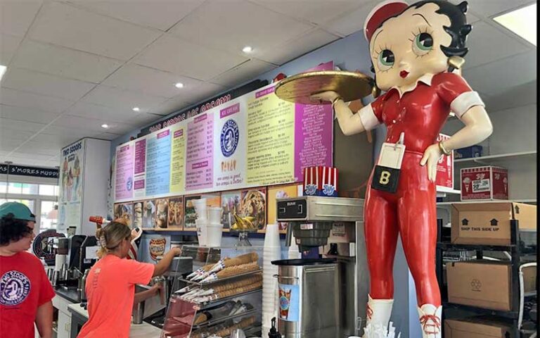 parlor counter with diners and betty boop statue at two scoops anna maria island