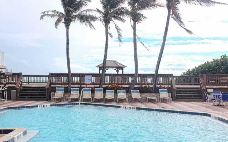 pool deck with beach access boardwalk at radisson suite hotel oceanfront melbourne beach