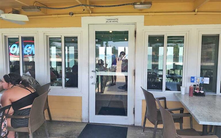 shaded front entrance to diner at rod reel pier anna maria island