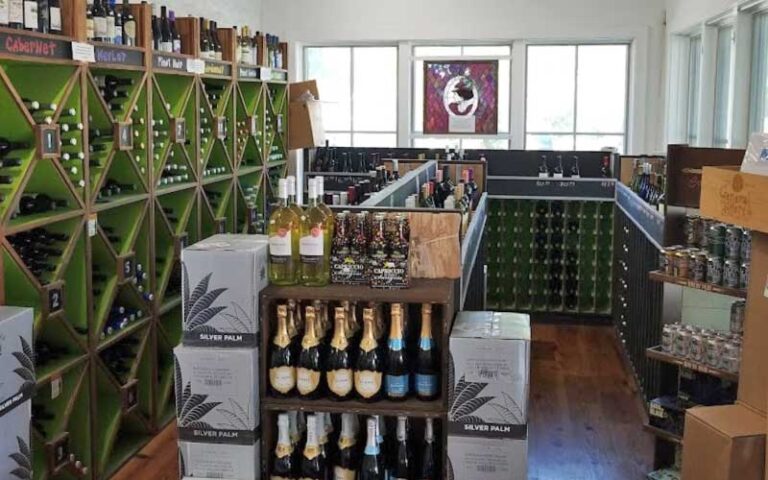 store interior with wine racks and bottles at anna maria general store