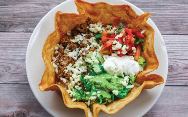 taco salad in tortilla bowl at san joses original mexican restaurant