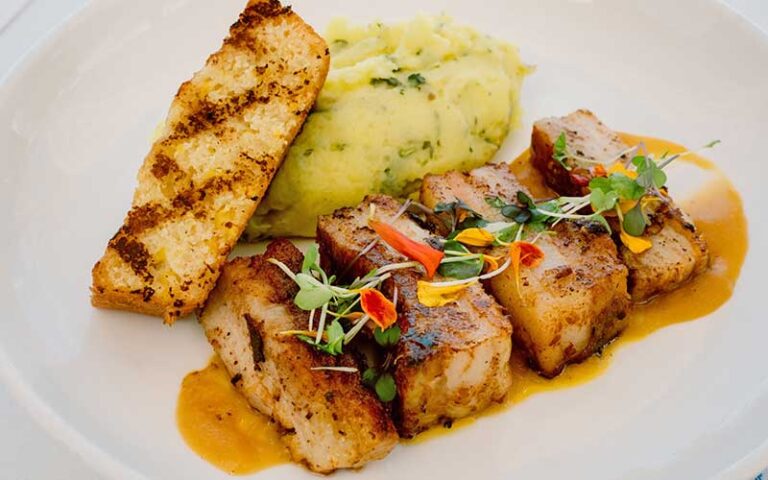 tofu steak with sides at sandbar seafood spirits anna maria island