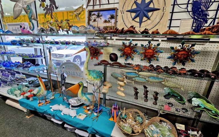 wall shelf with artsy beach items at green turtle shell gift shop bradenton beach