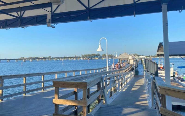 waterfront pier with marina and railing at bridge street pier bradenton beach anna maria island