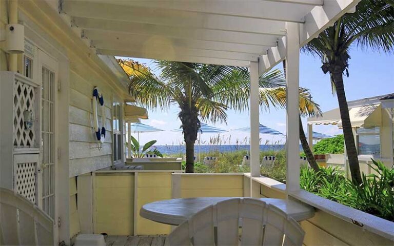 wooden porch with view of ocean at bungalow beach resort bradenton anna maria island